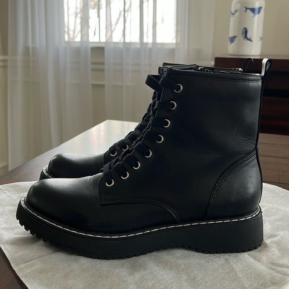 Madden Girl black boots in a size 8.